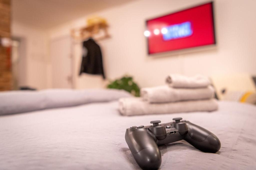 Letto o letti in una camera di Ambassador Yellow Home