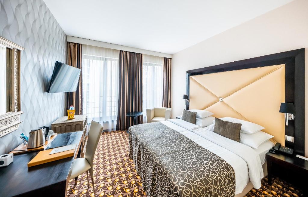 Postel nebo postele na pokoji v ubytování Grandior Hotel Prague