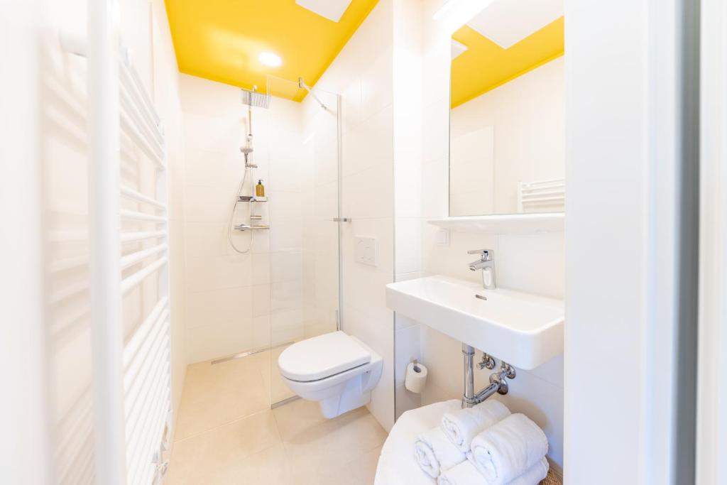 Koupelna v ubytování Boutiquehotel Caravella Velden by S4Y