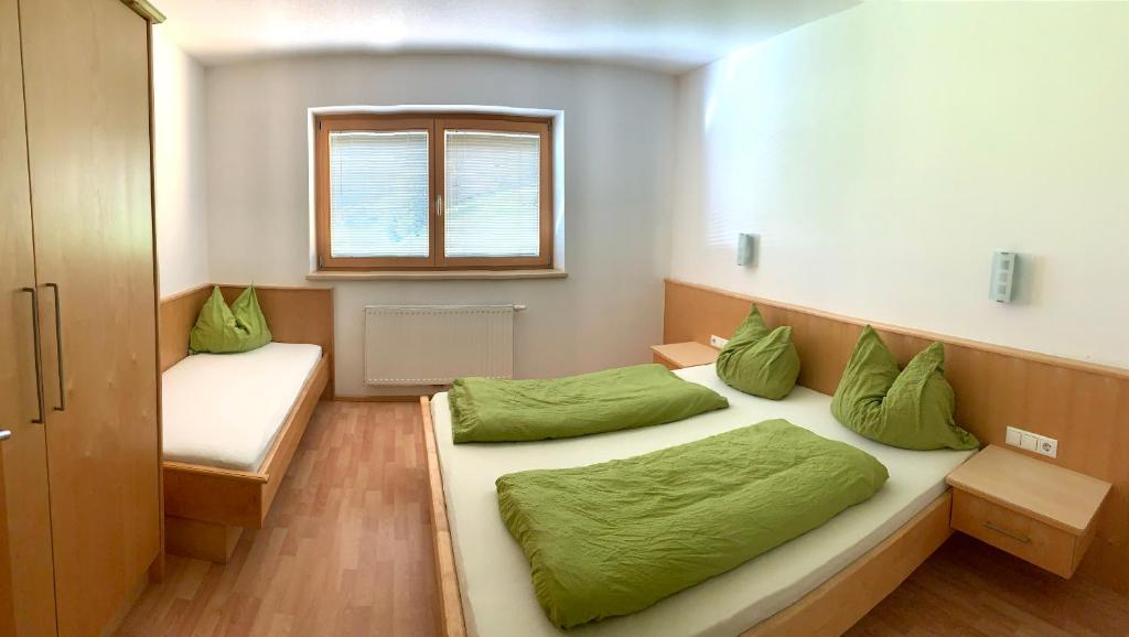 Posteľ alebo postele v izbe v ubytovaní Appartements Samerhof