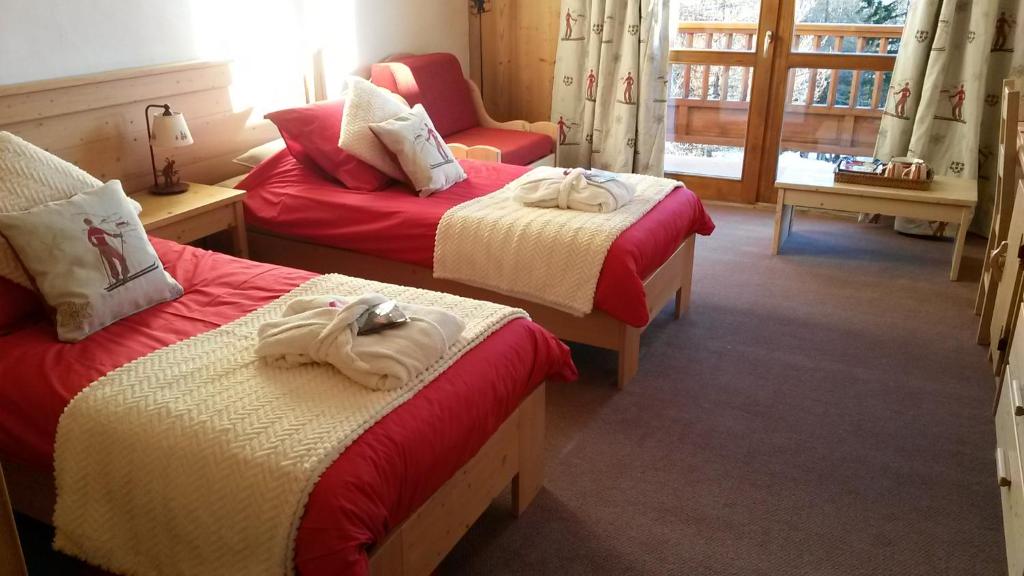 Postel nebo postele na pokoji v ubytování Chalet Matsuzaka - chambres d'hôtes de luxe