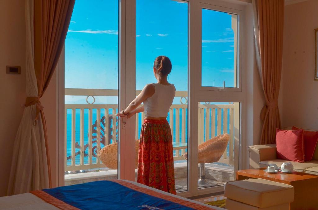 Rõdu või terrass majutusasutuses BlueSun Danang Beach Hotel
