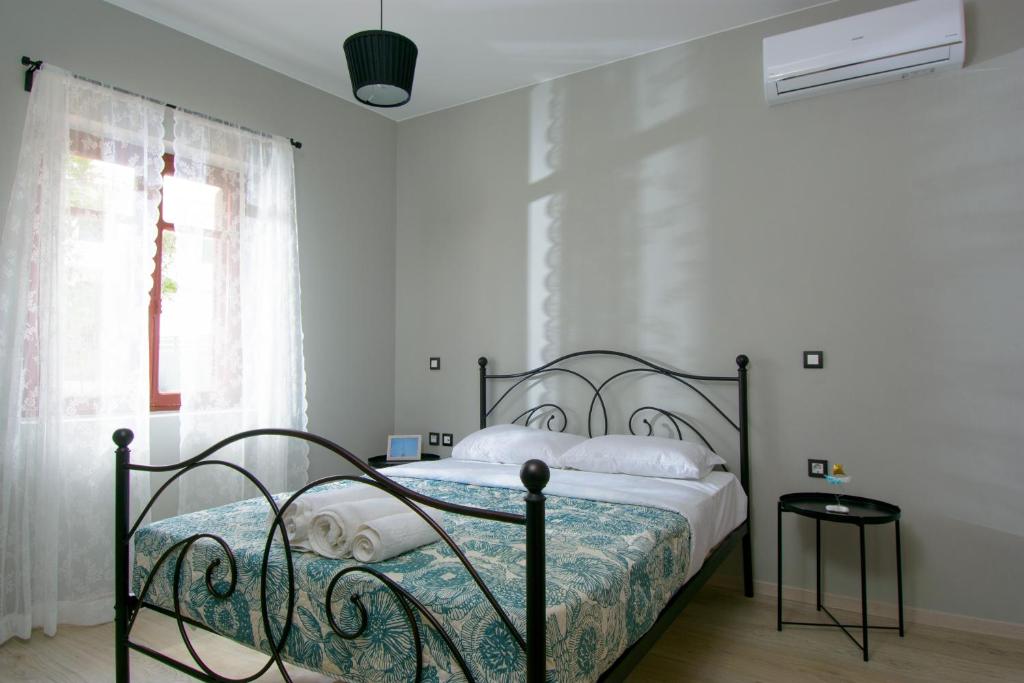 Postel nebo postele na pokoji v ubytování Pavlakis Lemon-Tree House