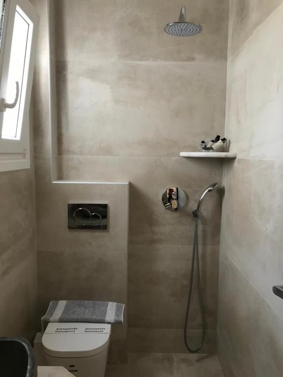 Koupelna v ubytování Vassiliki Rooms