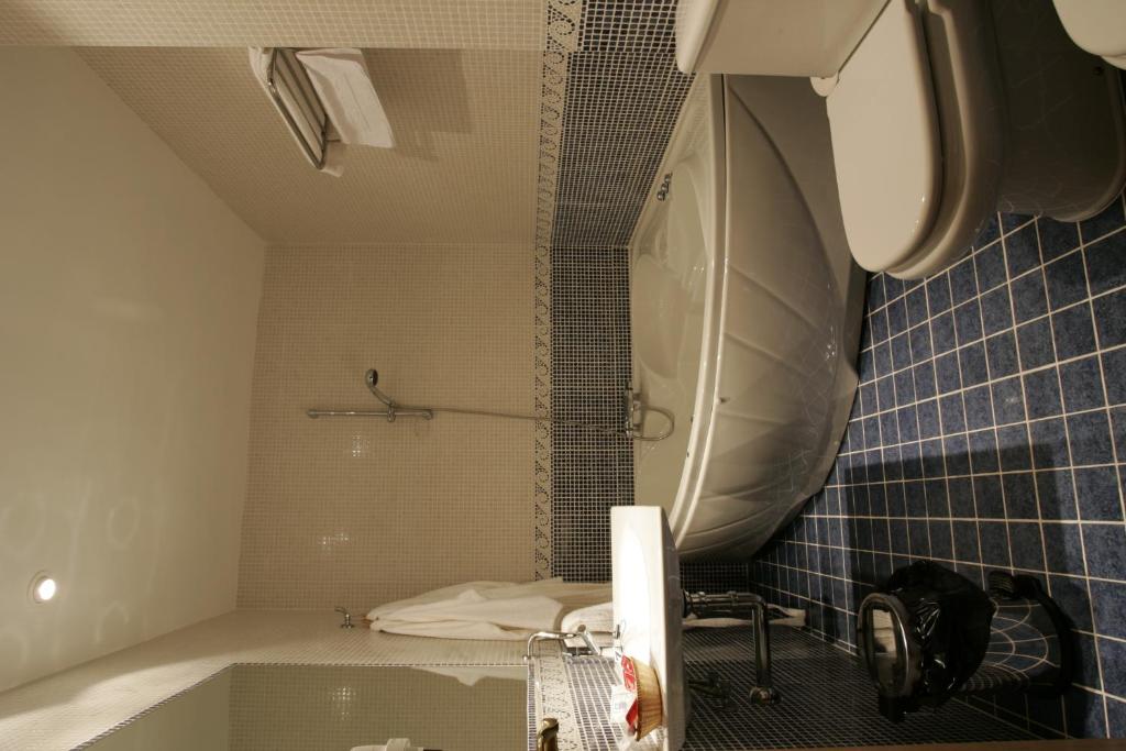 Koupelna v ubytování Hotel Galayos