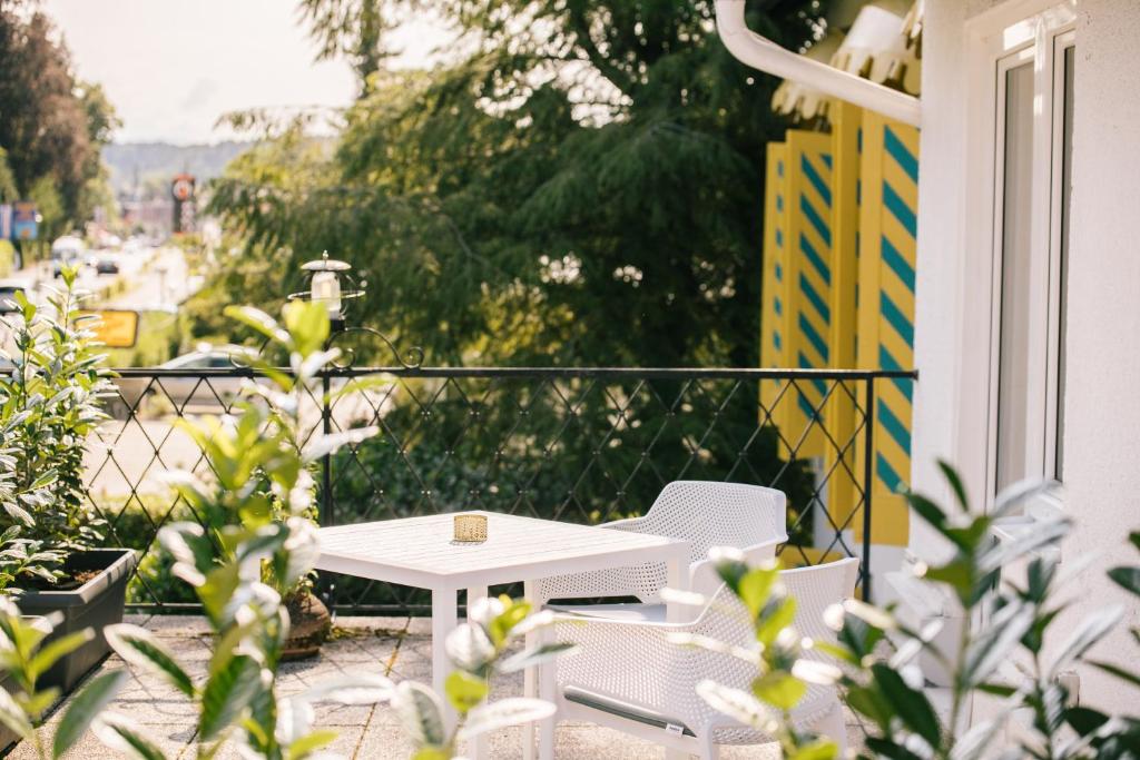 Balkón nebo terasa v ubytování Boutiquehotel Caravella Velden by S4Y