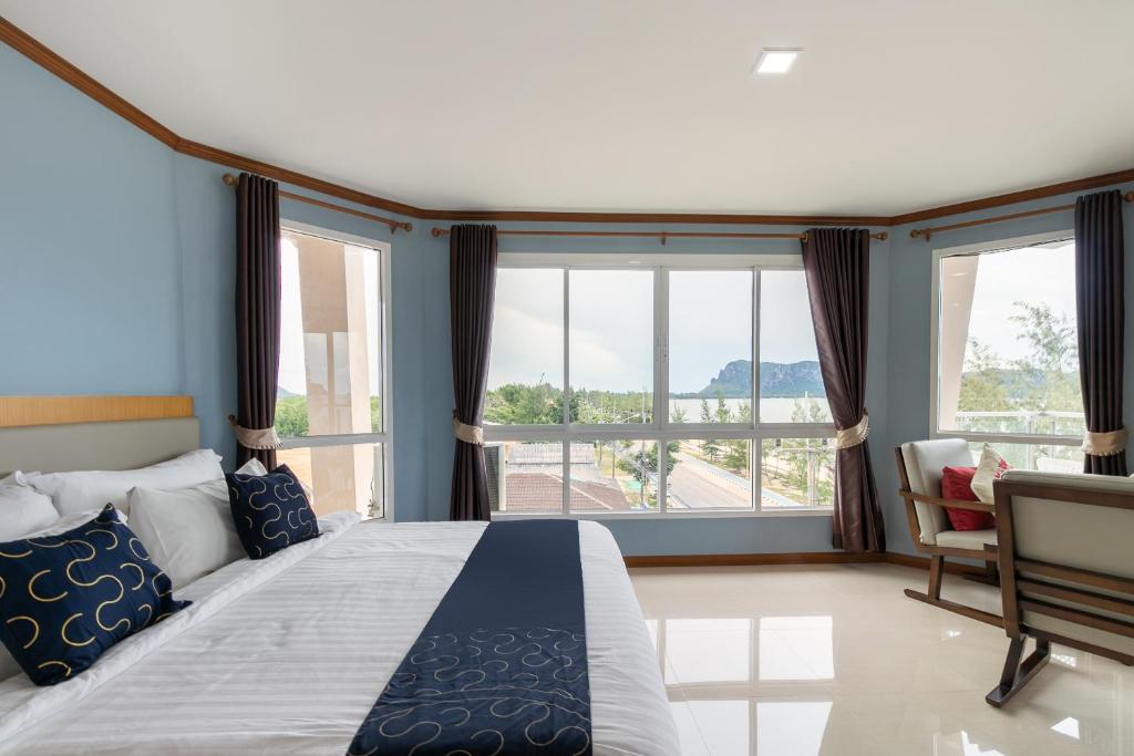 Postel nebo postele na pokoji v ubytování Golden Beach Boutique Resort