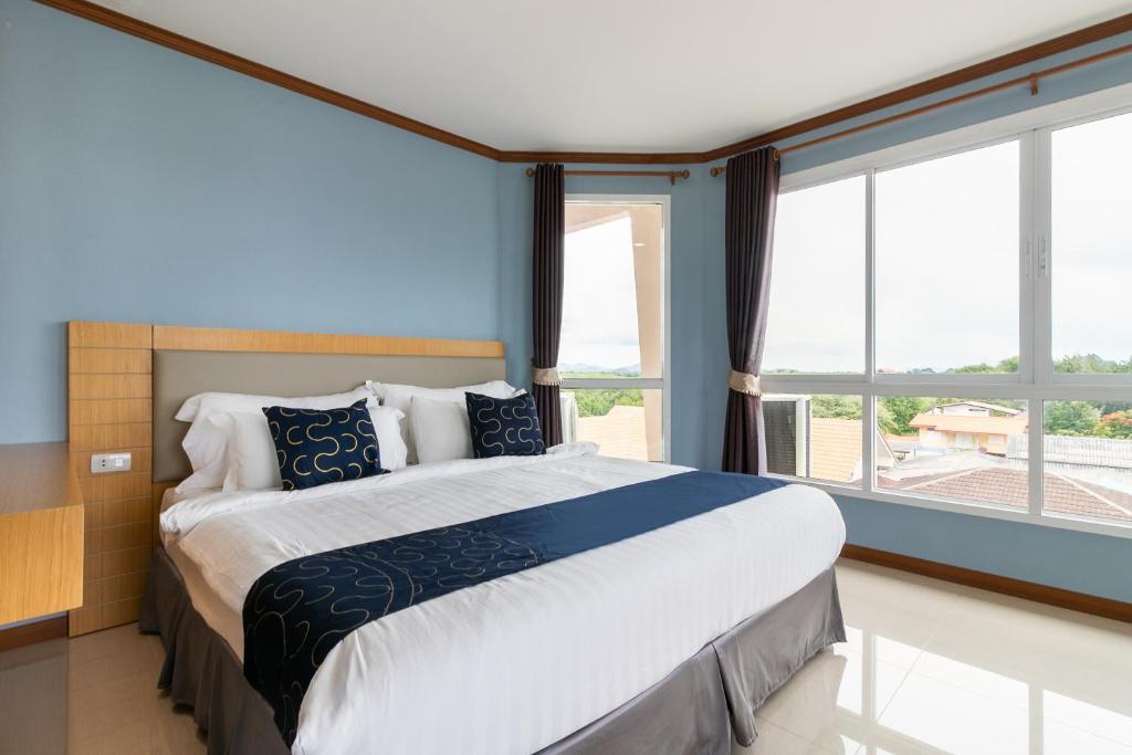Postel nebo postele na pokoji v ubytování Golden Beach Boutique Resort