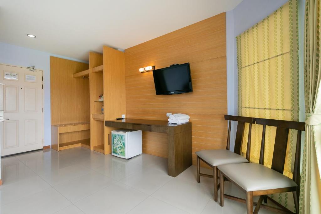 TV a/nebo společenská místnost v ubytování Golden Beach Boutique Resort