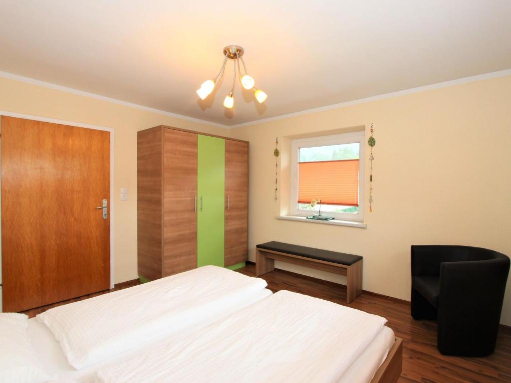 Postel nebo postele na pokoji v ubytování Apartment Heidi-2 by Interhome