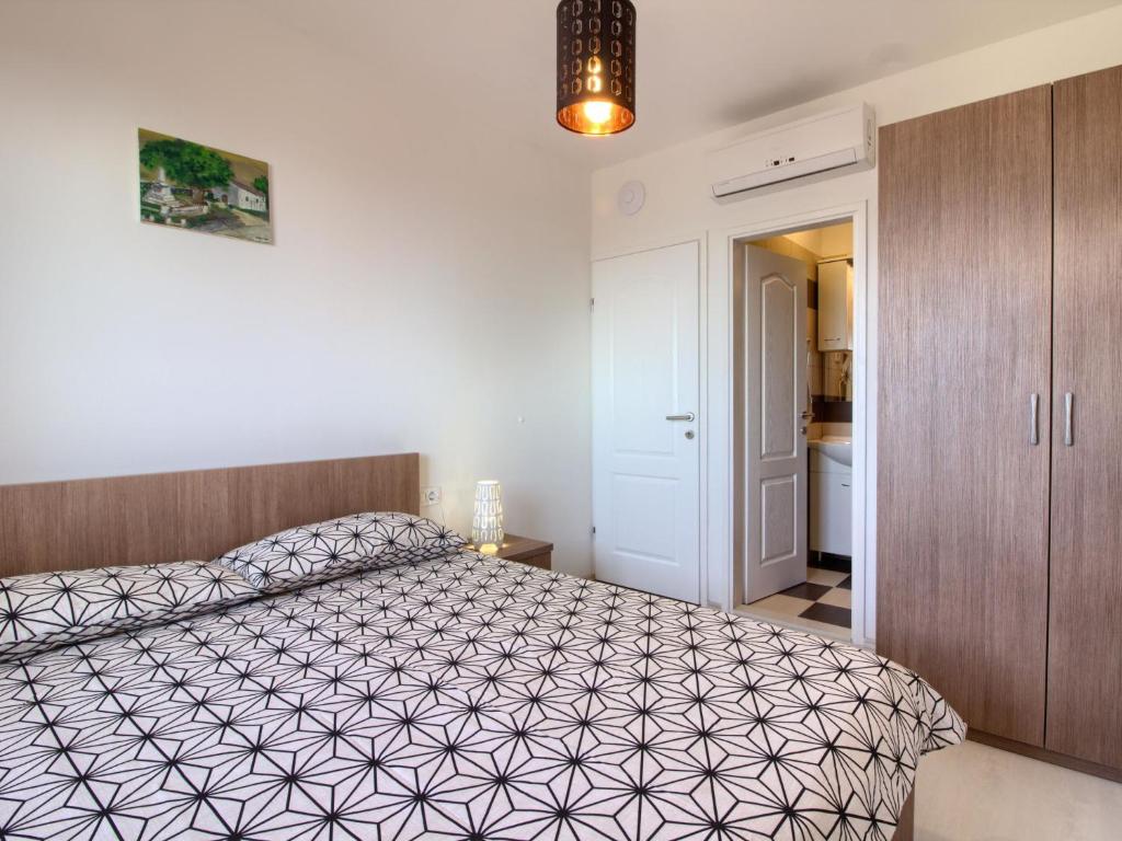 Posteľ alebo postele v izbe v ubytovaní Holiday Home Marevista by Interhome