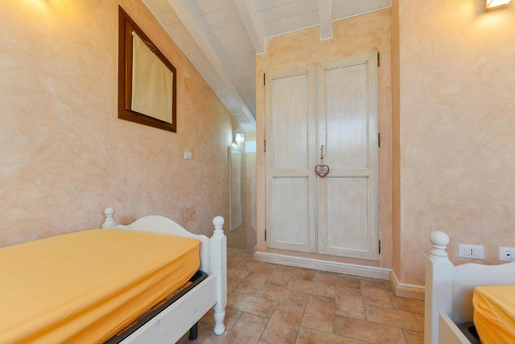 A bed or beds in a room at Lulù