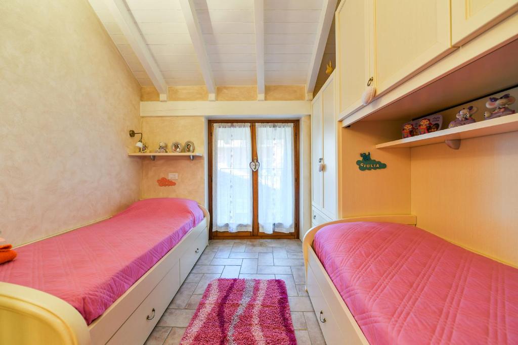 A bed or beds in a room at Lulù