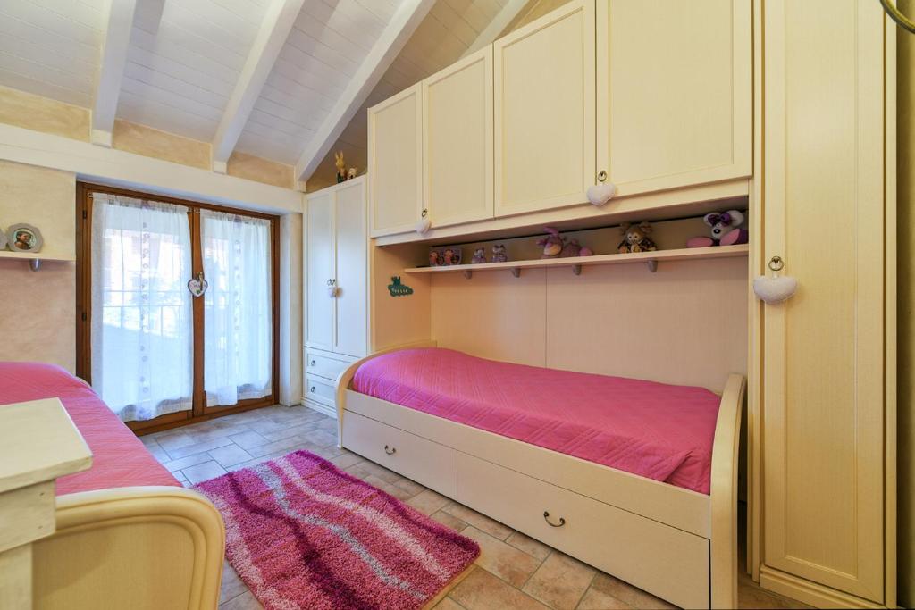 A bed or beds in a room at Lulù