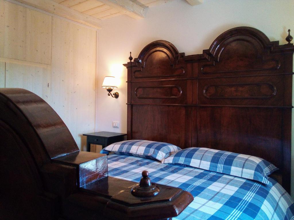 Postel nebo postele na pokoji v ubytování Da Andrea e Raffaella