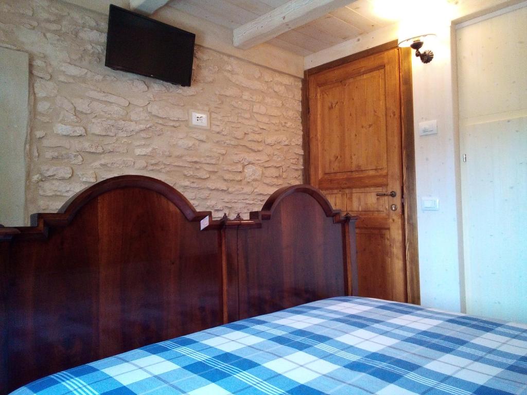 Postel nebo postele na pokoji v ubytování Da Andrea e Raffaella