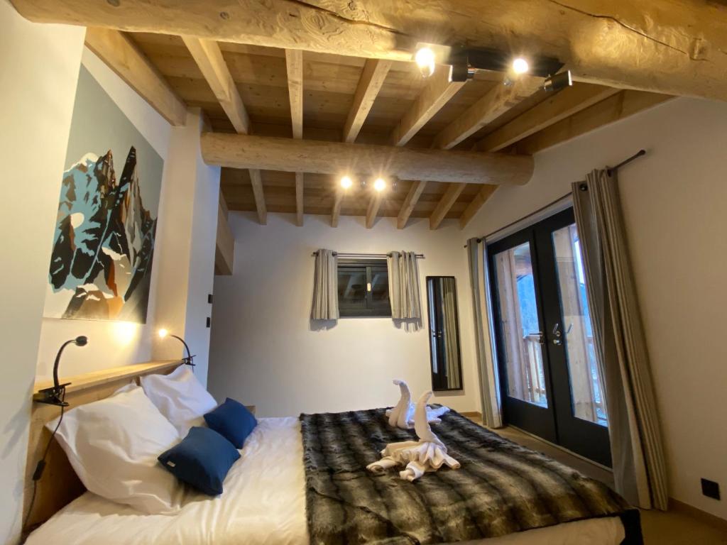 Postel nebo postele na pokoji v ubytování Chambres d'hôtes - B&B - Chalet Mountain Vibes
