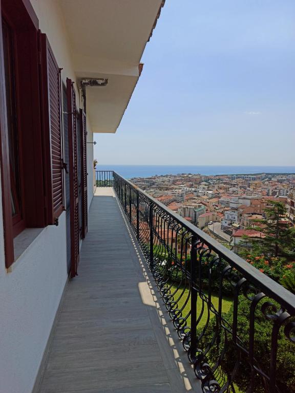 a balcony with a view of a city at VelaLatina Residence B&B Soverato in Soverato Marina