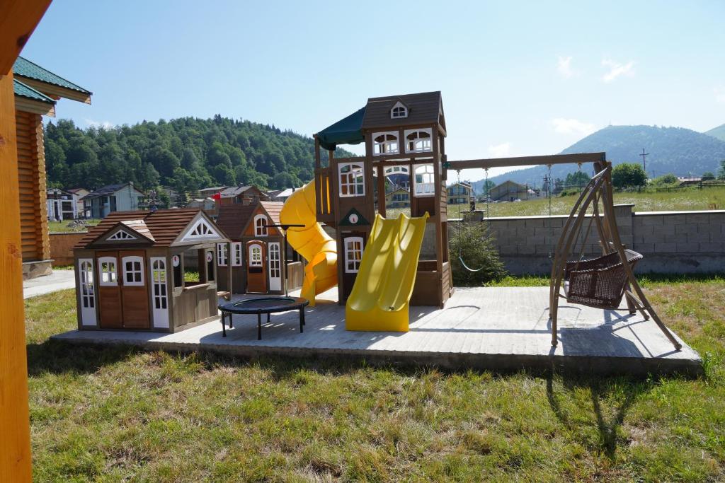 Herní místnost nebo prostor pro děti v ubytování LOG HOUSE