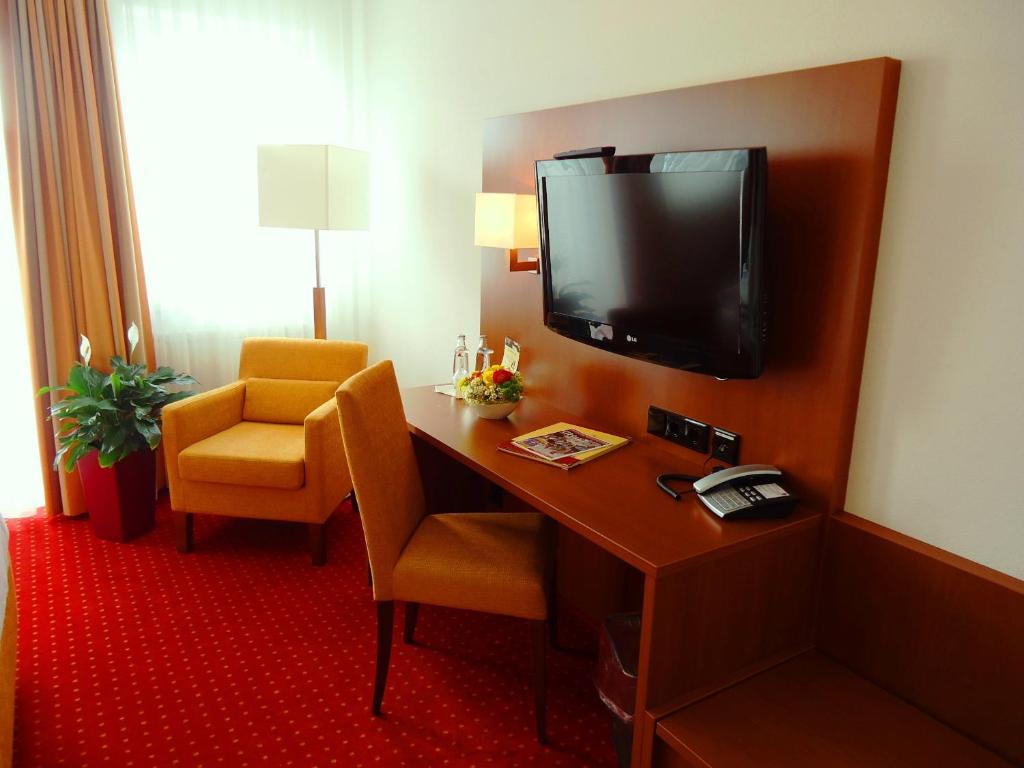 TV a/nebo společenská místnost v ubytování Hotel Gasthof Posthalter