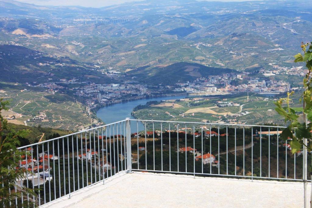 a view from the top of a mountain with a river at Paraíso Douro AL in Lamego