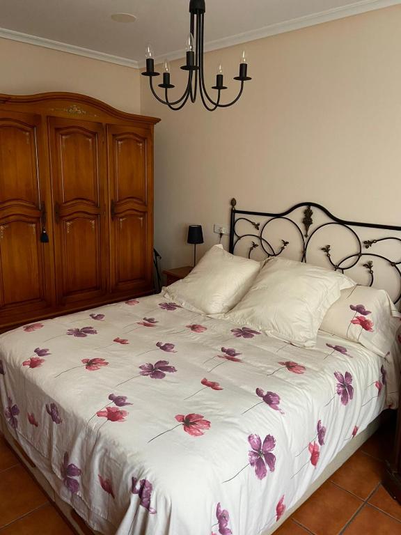 Postel nebo postele na pokoji v ubytování APARTAMENTO PUERTO FOZ