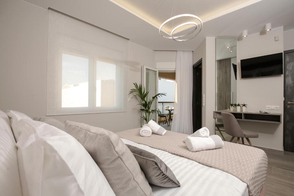 TV a/nebo společenská místnost v ubytování Limosa Luxury Residences