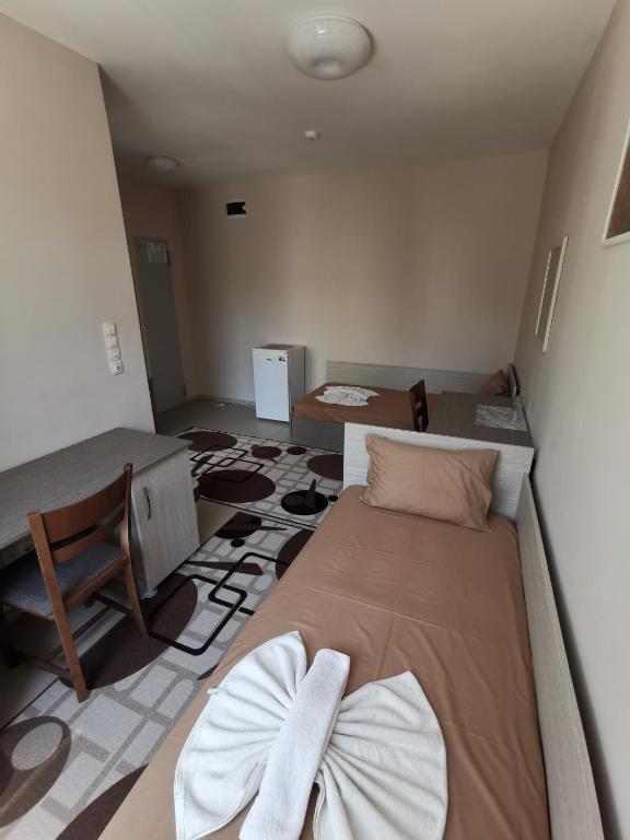 A bed or beds in a room at Hostel Penev