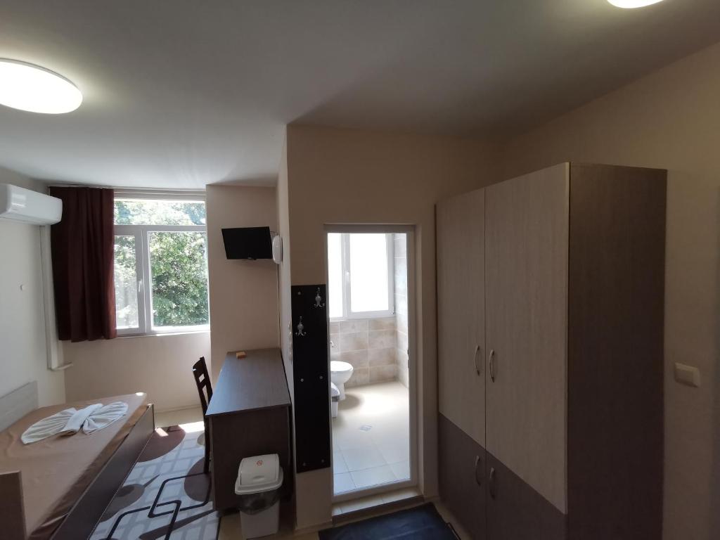 A television and/or entertainment centre at Hostel Penev