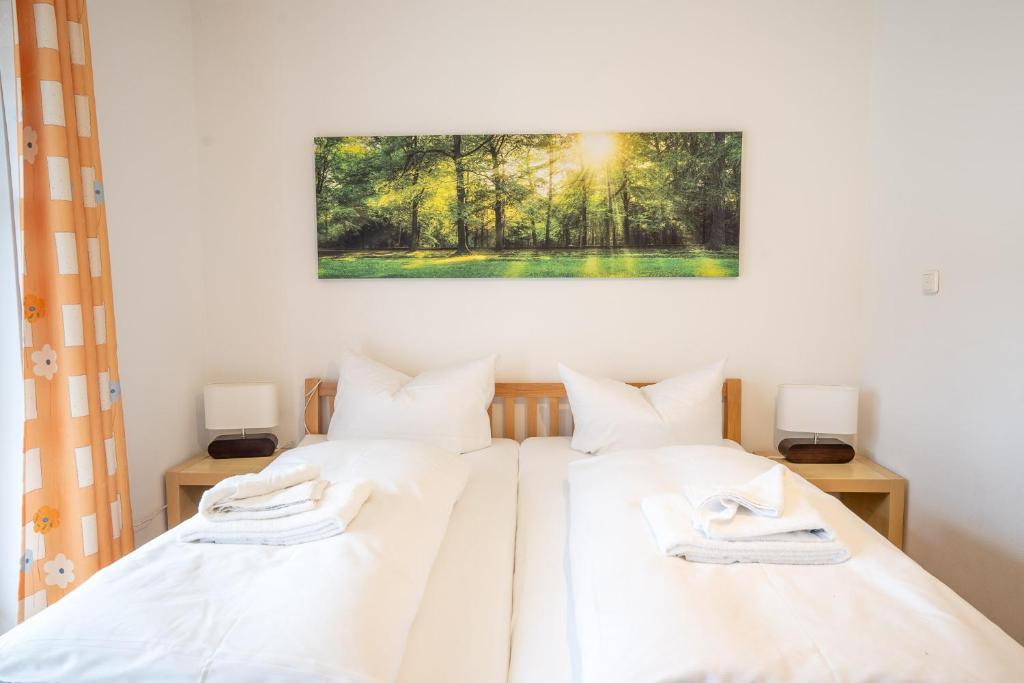 Postel nebo postele na pokoji v ubytování Haus Göhl