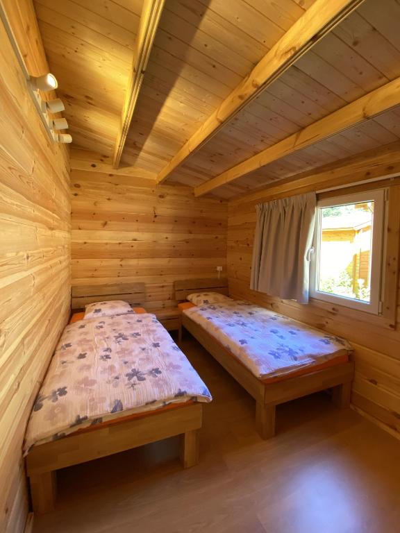 Postel nebo postele na pokoji v ubytování Camping Piccolo Paradiso