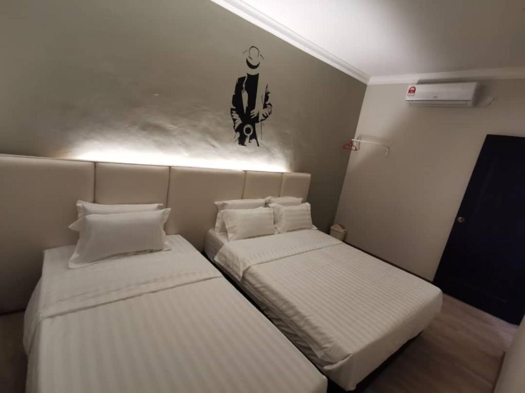 Letto o letti in una camera di Foresight Hotel