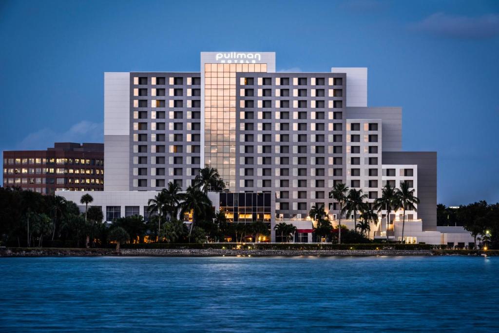 a rendering of the trump hotel and casino from the water at Pullman Miami Airport in Miami