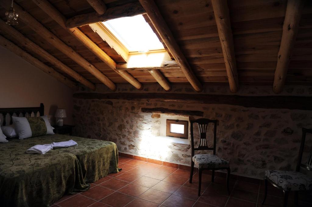 Postel nebo postele na pokoji v ubytování Hotel Rural El Labrador