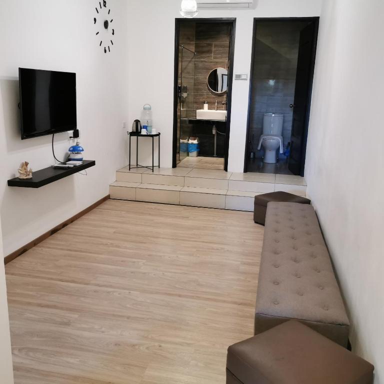 TV o dispositivi per l'intrattenimento presso Foresight Hotel