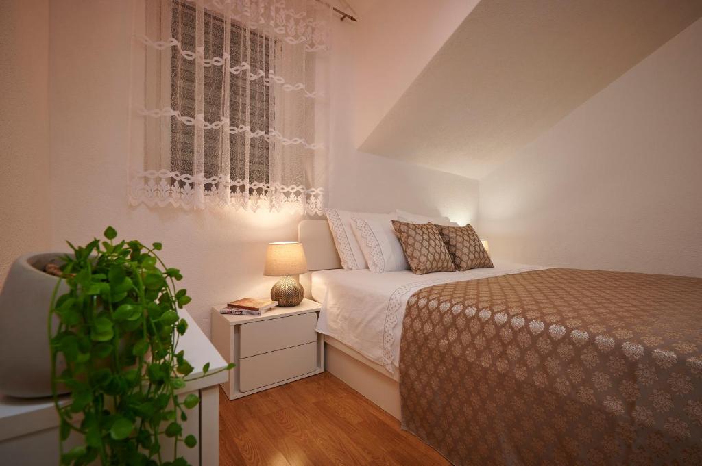 Posteľ alebo postele v izbe v ubytovaní Apartment Ana-Marija