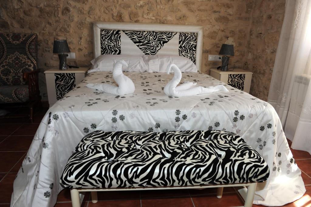 Postel nebo postele na pokoji v ubytování Hotel Rural El Labrador