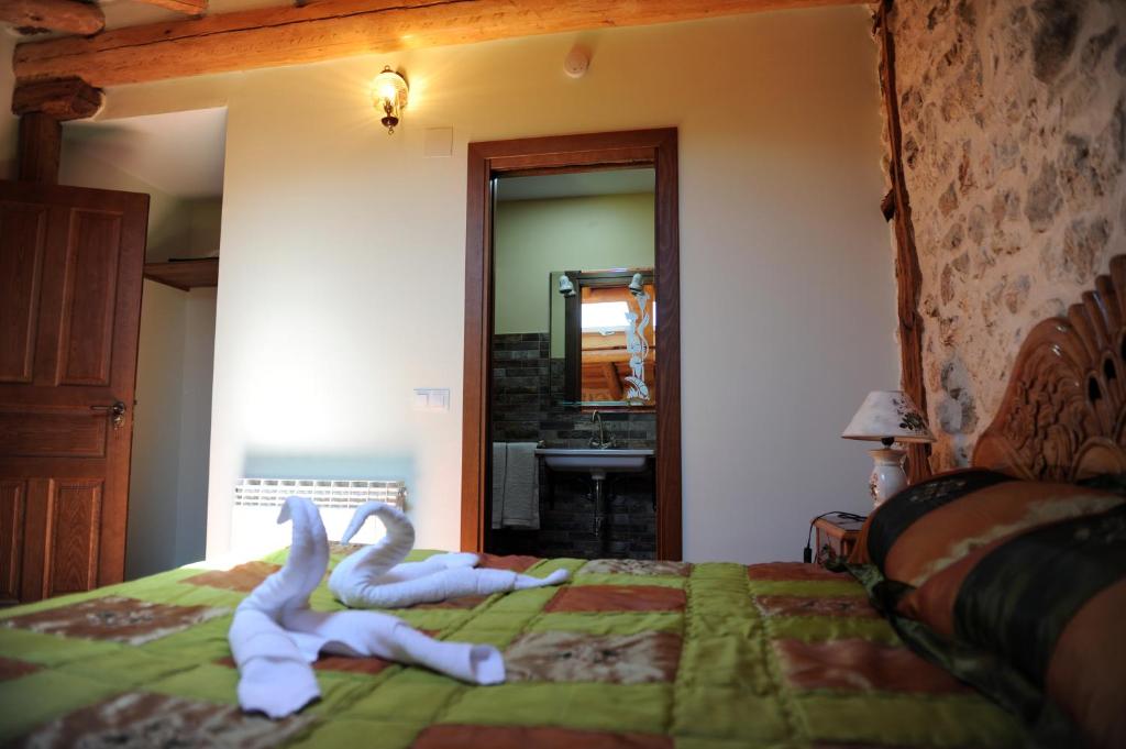 Postel nebo postele na pokoji v ubytování Hotel Rural El Labrador