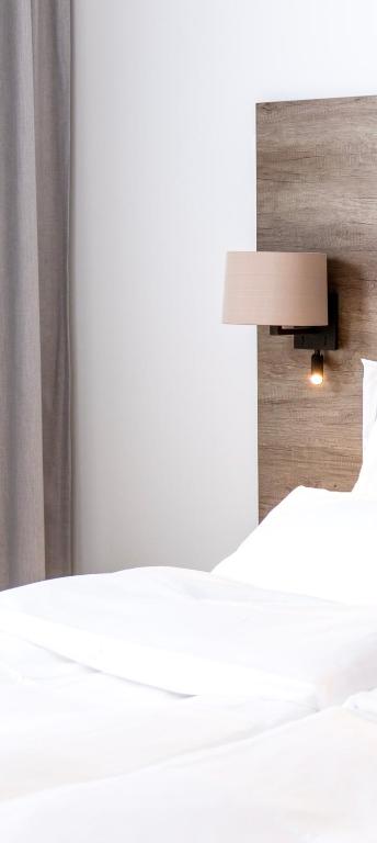 Ein Bett oder Betten in einem Zimmer der Unterkunft Premium Green Apartments Vienna