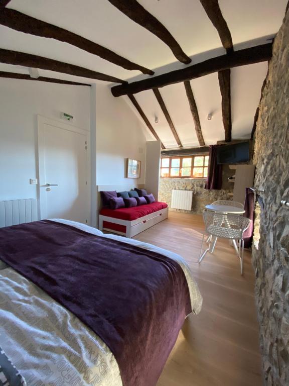 Postel nebo postele na pokoji v ubytování Casa Rural Martiamuno Landetxea