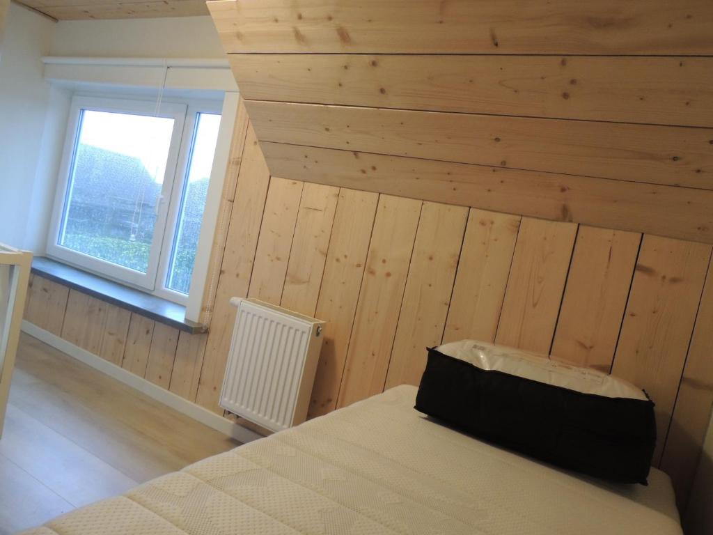 Postel nebo postele na pokoji v ubytování "De VRIJBOS ROUTE" alleenstaande dubbele woning!