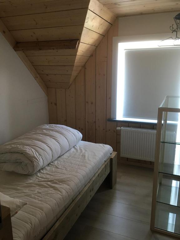 Postel nebo postele na pokoji v ubytování "De VRIJBOS ROUTE" alleenstaande dubbele woning!