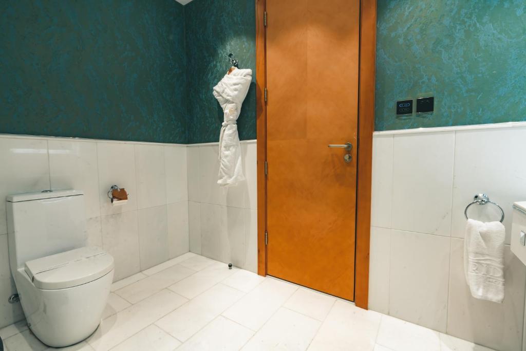 Koupelna v ubytování Iridium Hotel