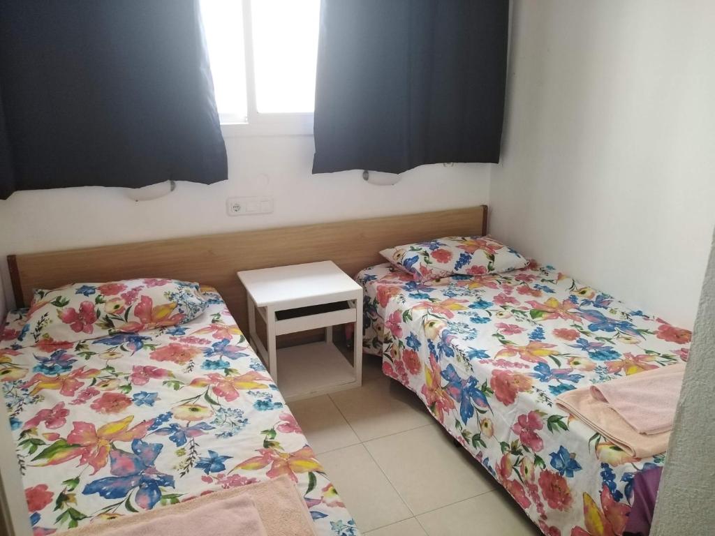 Postel nebo postele na pokoji v ubytování Can Pau Guesthouse