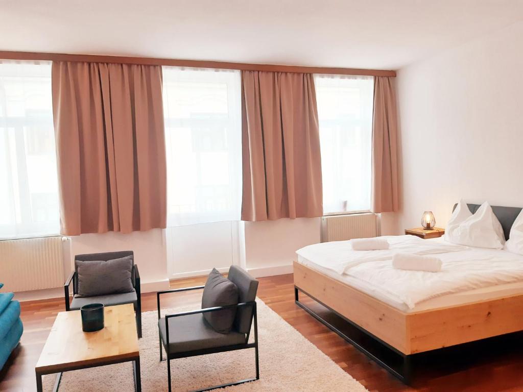 Posteľ alebo postele v izbe v ubytovaní APARTMENTS zum Wohlfühlen MARIAZELL