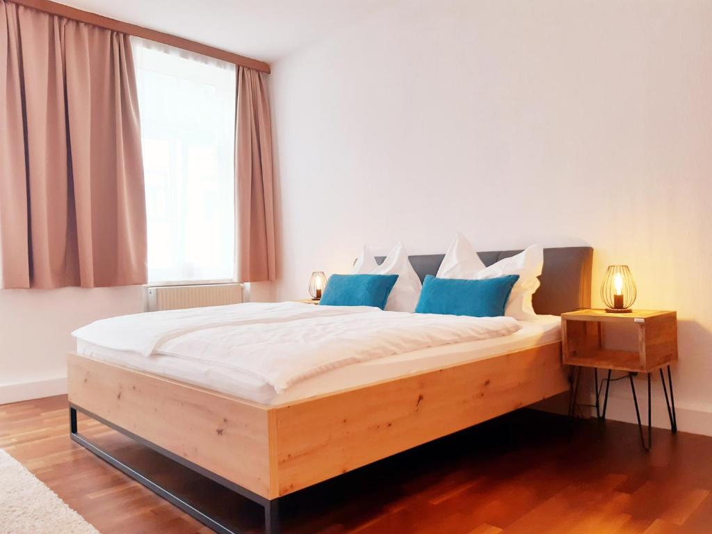 Posteľ alebo postele v izbe v ubytovaní APARTMENTS zum Wohlfühlen MARIAZELL