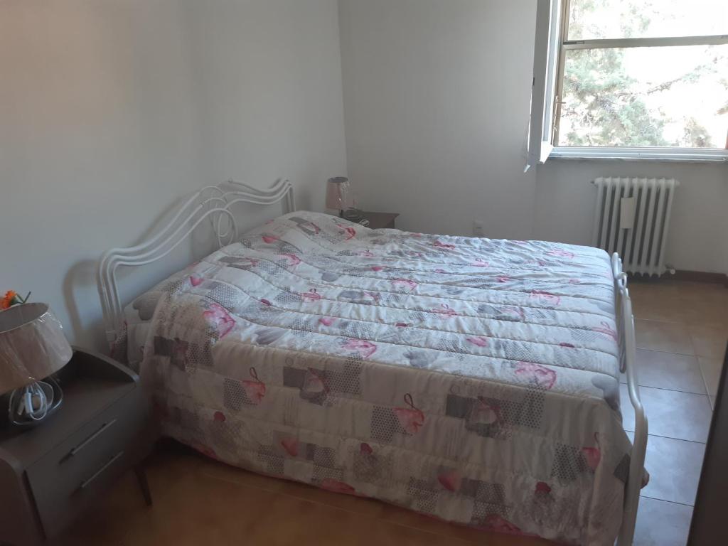 Posteľ alebo postele v izbe v ubytovaní Appartamento Spoletosfera