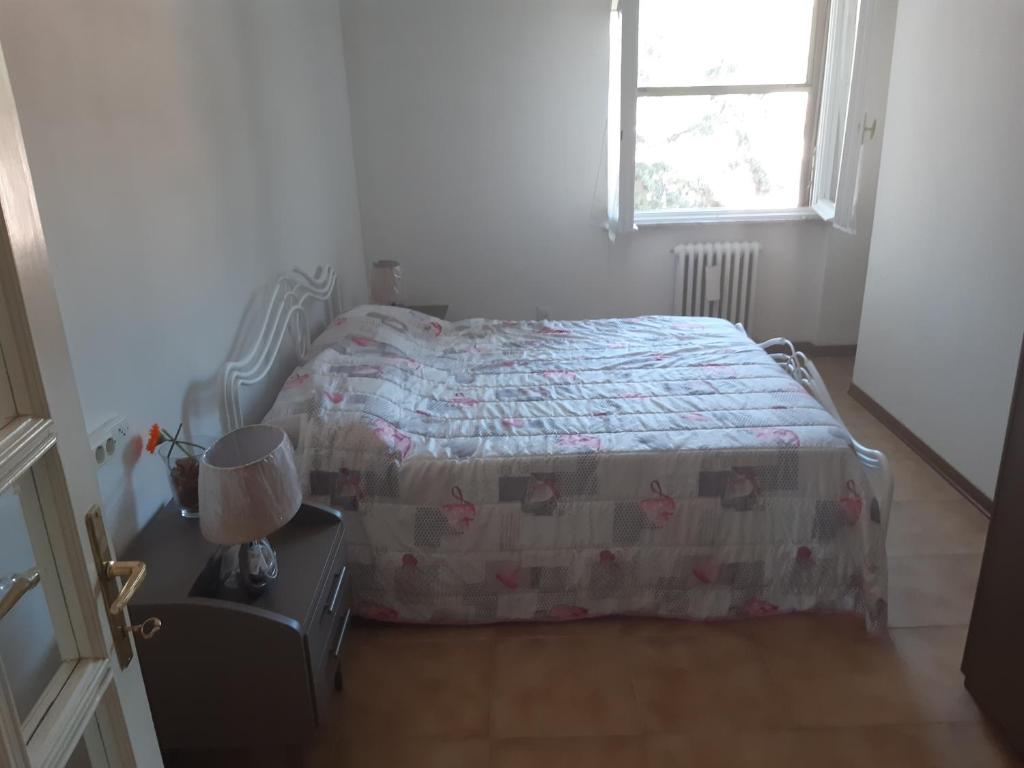 Posteľ alebo postele v izbe v ubytovaní Appartamento Spoletosfera
