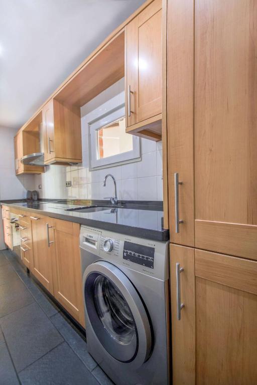 Kuchyň nebo kuchyňský kout v ubytování Apartamento en Puerto Marina
