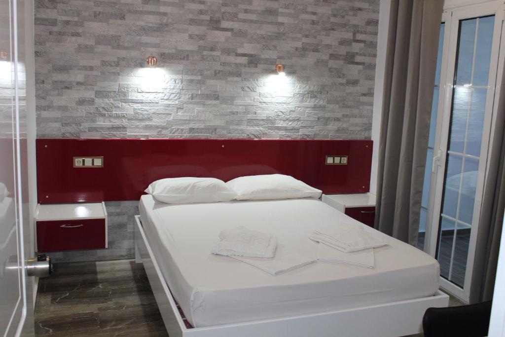 Postel nebo postele na pokoji v ubytování Bay View Apartments